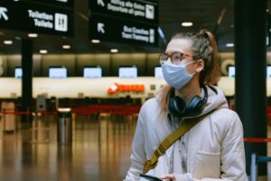 woman wearing face mask 2019 coronavirus disease myths